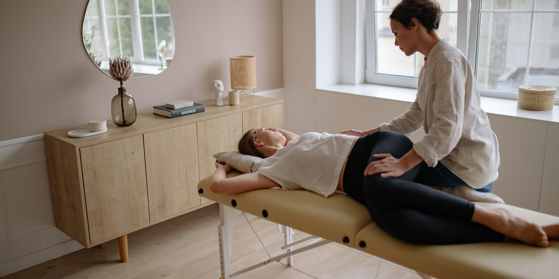 middlepathspa_woman doing thai massage Thai massage for body