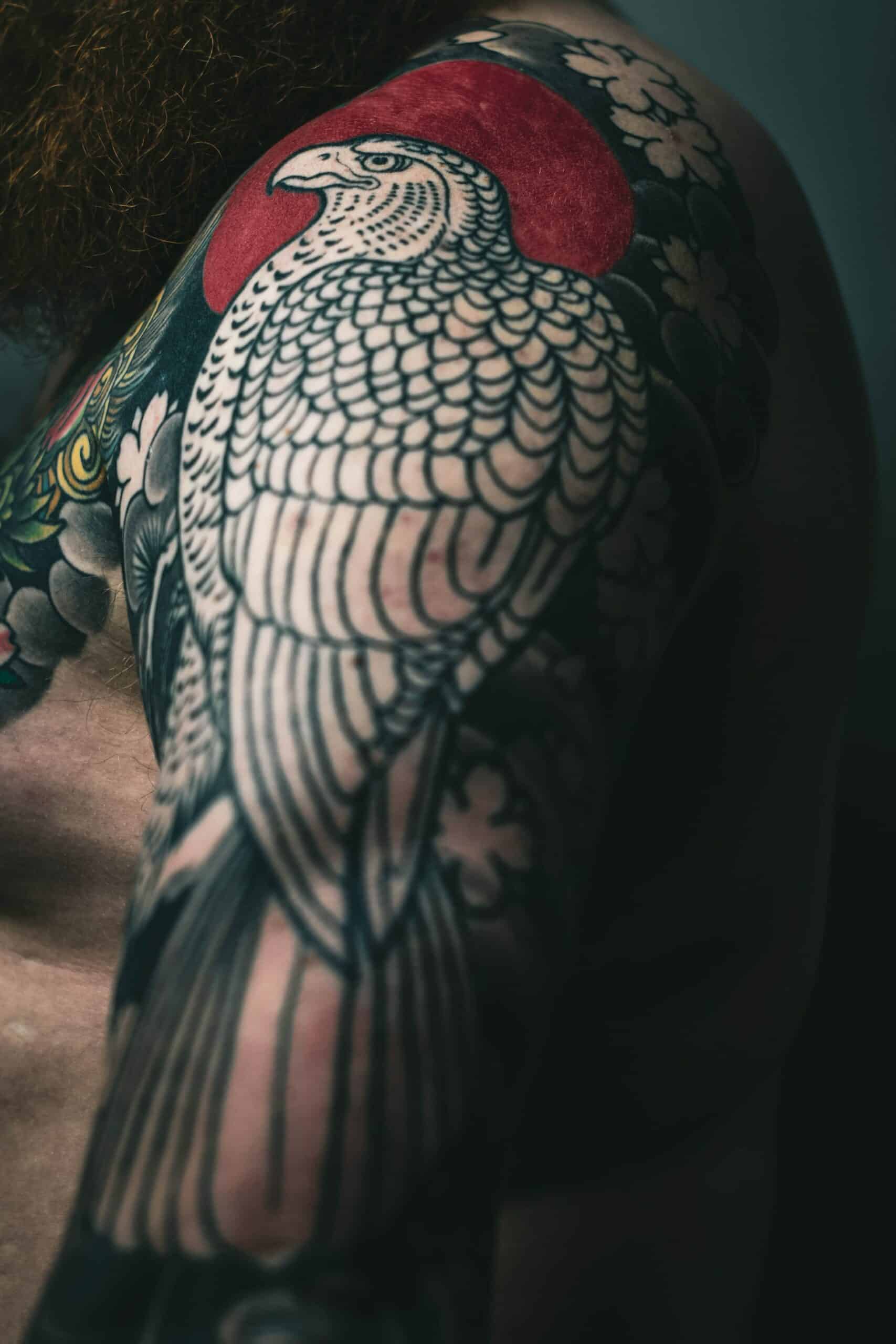 man with eagle bird tattoo