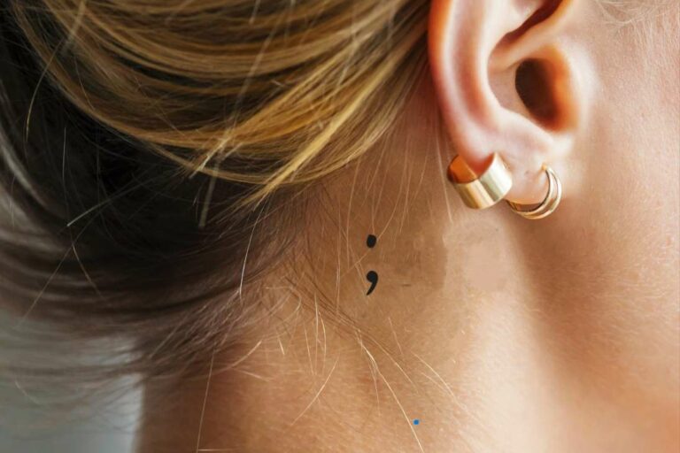 Girl with a semi-colon tattoo