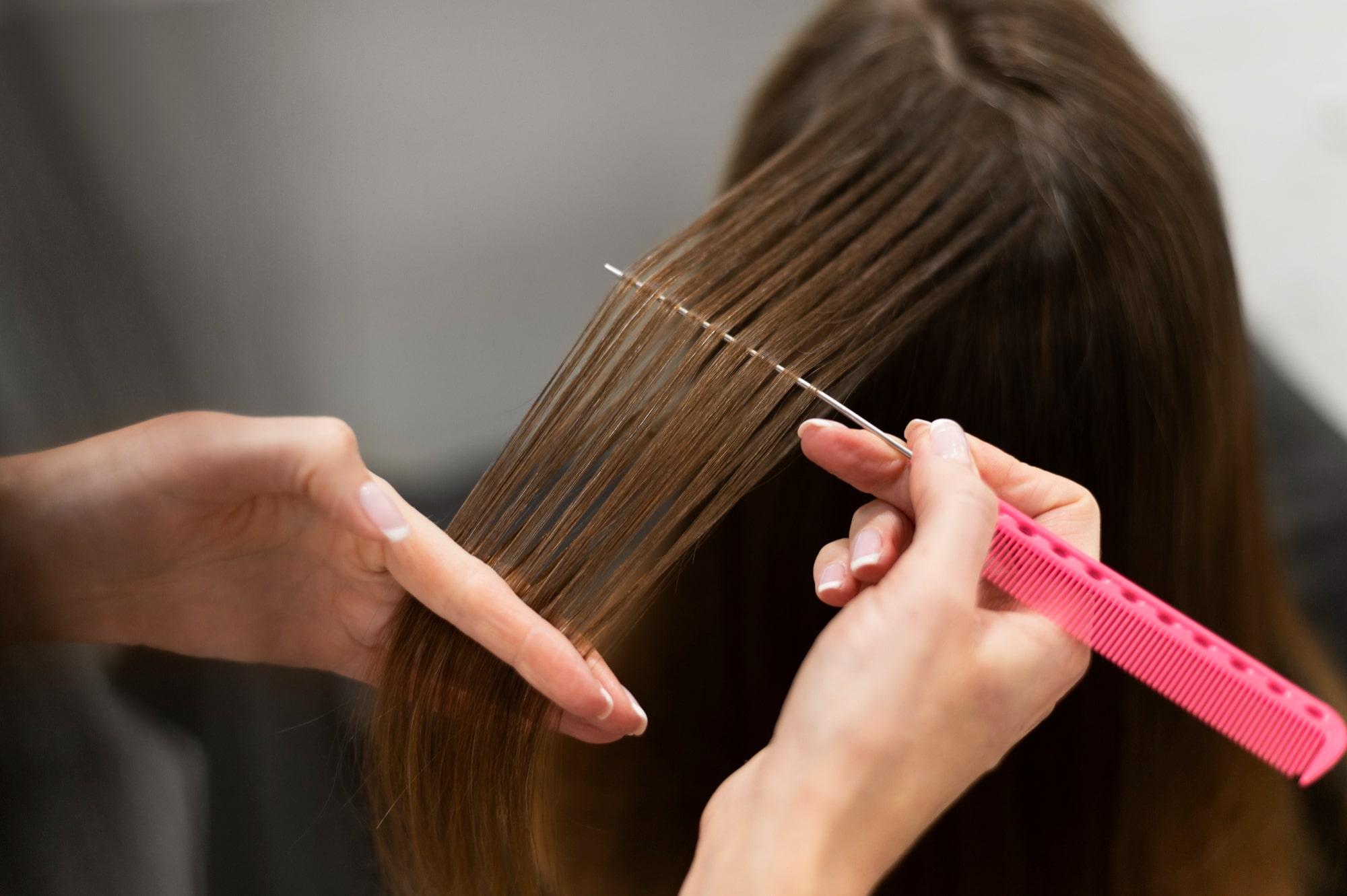 applying hair extensions